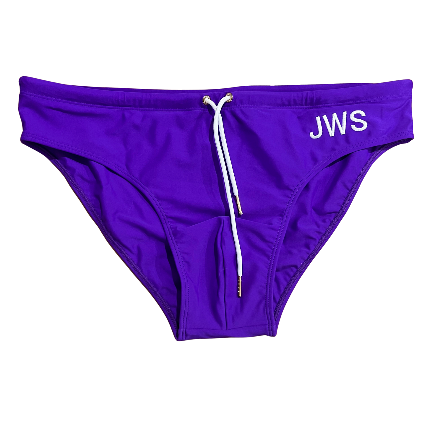 Royal purple men's swim brief flat-lay with white drawcord and gold tips — JWS Swimwear