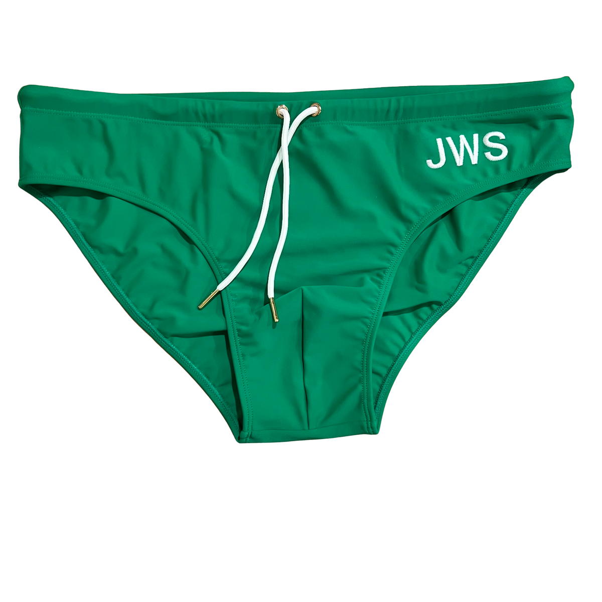 Emerald green men's swim brief flat-lay with white drawcord and gold tips — JWS Swimwear