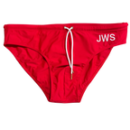 Red men's swim brief flat-lay with white drawcord and gold tips — JWS Swimwear